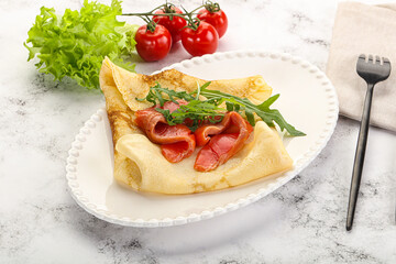Russian pancake with salmon fish