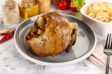 Baked pork knee with spices