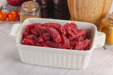 Raw beef meat - sliced strips