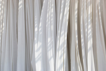 Fototapeta premium whie linnen hanging in sunlight 