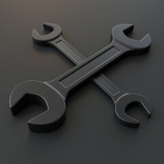 Two black wrenches are laid in a cross formation on a dark matte surface.