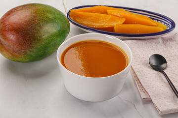 Sweet mango puree in the bowl