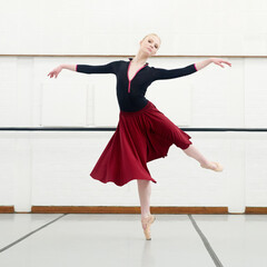 Woman, ballet and dancing in studio for fitness, exercise and training for performance or show....