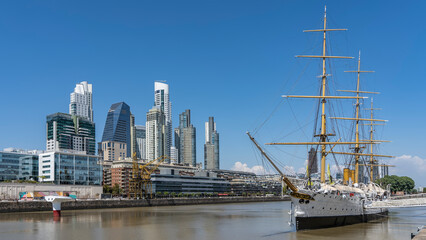 A beautiful old sailing ship is moored at the Buenos Aires waterfront. Masts, spars, rigging,...