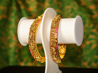 Traditional Indian design gold bangle. Fancy designer antique golden Bangles also known as 