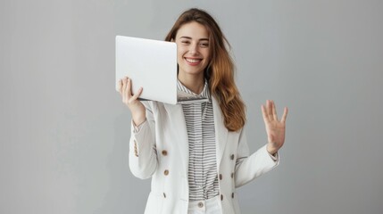 Fototapeta premium Young Woman Holding Laptop