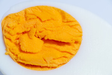 Cooked egg isolated on white background,Close up of egg yolk 