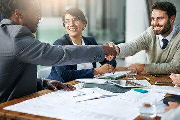 Team, handshake and agreement in office for business, development and project management in...