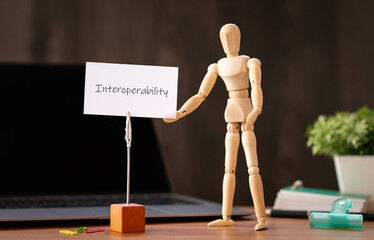 There is word card with the word Interoperability. It is as an eye-catching image.