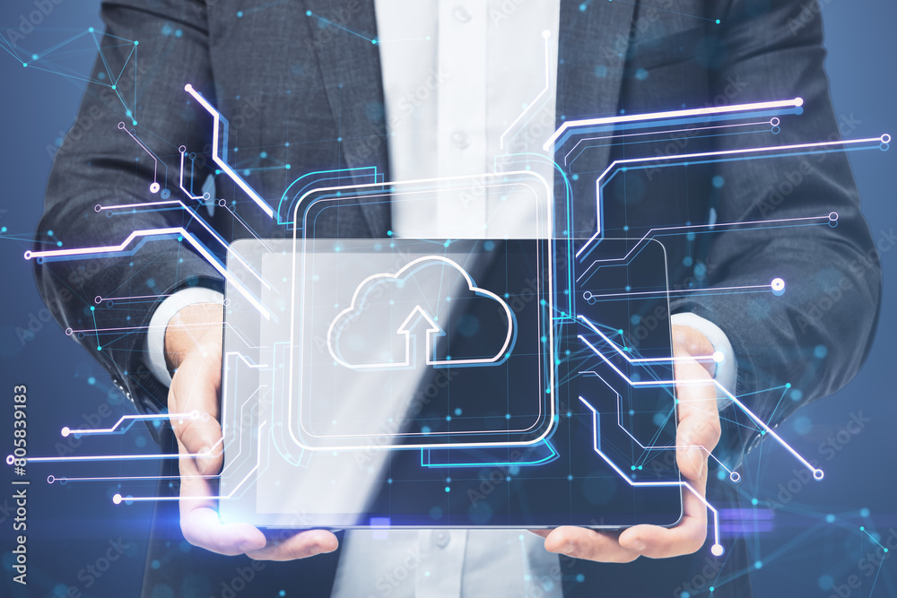 Poster Close up of businessman hands holding tablet with creative square circuit button hologram with cloud icon. Technology and cloud computing concept. Double exposure.
