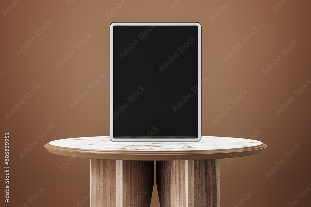 Poster Empty wooden table with black mock up tablet on brown background. 3D Rendering.