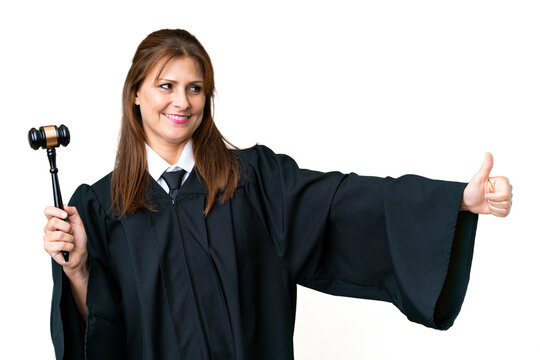 Judge caucasian woman over isolated background giving a thumbs up gesture