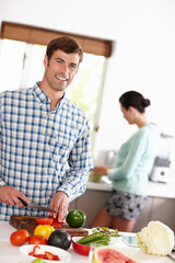 Man, smile and portrait in kitchen with vegetable and girlfriend for food and cooking together healthy meal for detox. Boyfriend or young person and happy in house with ingredients for nutrition
