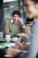 Portrait, meeting and man with smile, thinking and employees in boardroom, discussion and idea for agency. Creative, teamwork and listening for strategy, copywriting and editor in company and morning