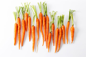 Fresh and sweet ripe orange carrot on white background