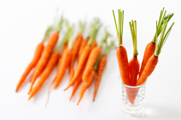 Fresh and sweet ripe orange carrot on white background