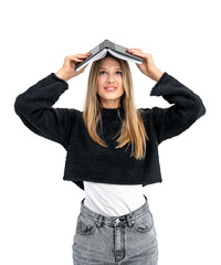 Woman in casual outfit with book on head, isolated over white background