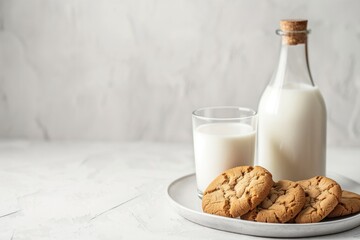 Fresh Milk in Glass and Bottle with Cookies on Marble Background