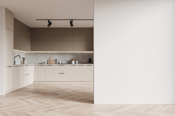 Modern kitchen interior with wooden elements on furniture and floor, a blank white wall as copy space, minimalist style, 3D Rendering.