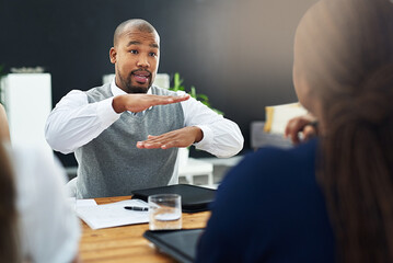 Explain, business people and man in meeting, conversation and teamwork with confidence in workplace. Group, leader and employee with communication, discussion and cooperation for project and growth