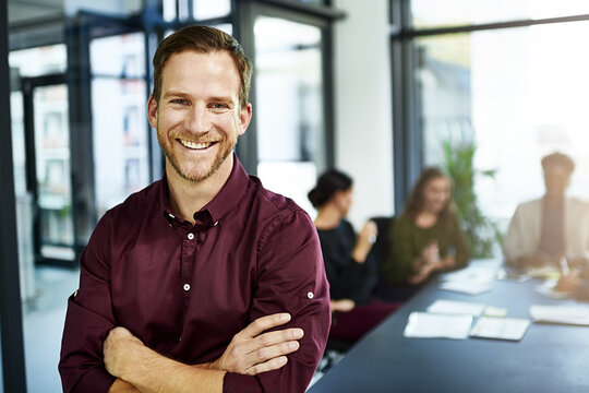 Business meeting, man and confidence portrait with public relations worker and team in office. Startup, employee and boss at company with smile in job boardroom with speaker ready for training
