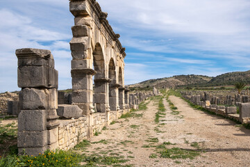 The Decumanus Maximus perspective view of the main street. Roman Archaeological Site of Volubilis,...
