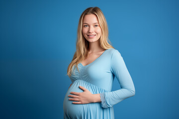 Young pretty blonde Pregnant girl over isolated colorful background