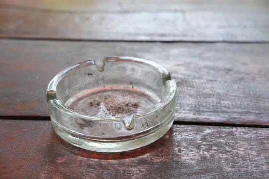 empty ashtray on wooden table