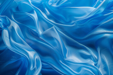 Obraz premium Rich blue satin waves creating a soothing texture of luxury and elegance.