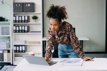 Modern business african woman in the office with copy space