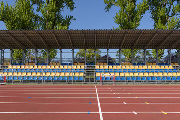 SPORTS FACILITIES - Running track and stands for spectators at an athletics stadium