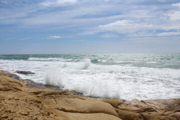 beautiful view of seashore,waves on the beach,   travel