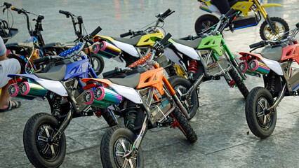 mini motor bikes for children at phu quoc harbor promenade