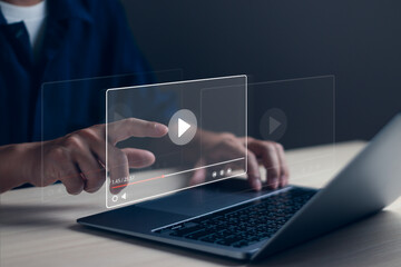 video streaming watch tv online concept, digital technology online with content,man tapping to watch movies, watch live line on virtual screens displayed on multimedia provider platform with computer
