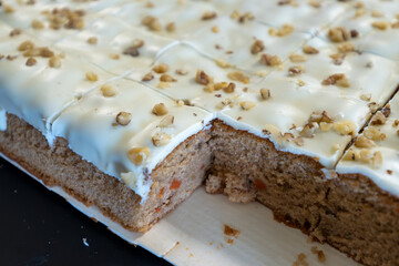 Vegan carrot cake with walnotes in pieces