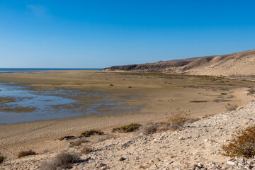 Sandy dunes and turquoise water of Sotavento beach, Costa Calma, Fuerteventura, Canary islands, Spain in winter