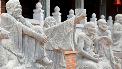 statues at truc lam ho temple