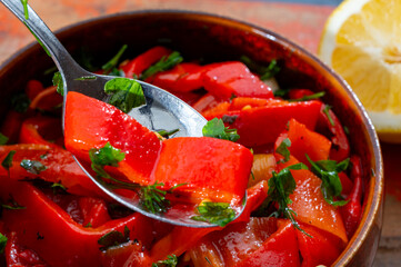 Grilled red peppers, sweet paprika salade with fresh garlic and parsley