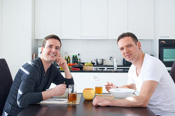 Food, gay couple and home kitchen for breakfast, meal and bonding time on weekend. Partnership, married and male people in house for eating, nutrition and smile or portrait for lgbt relationship