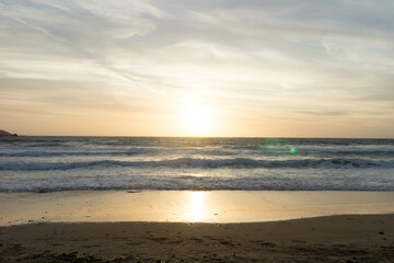 Stunning sunset over sea in Golden Bay Malta.