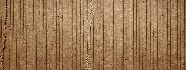 Close up of a crumpled brown paper with wood and twig pattern