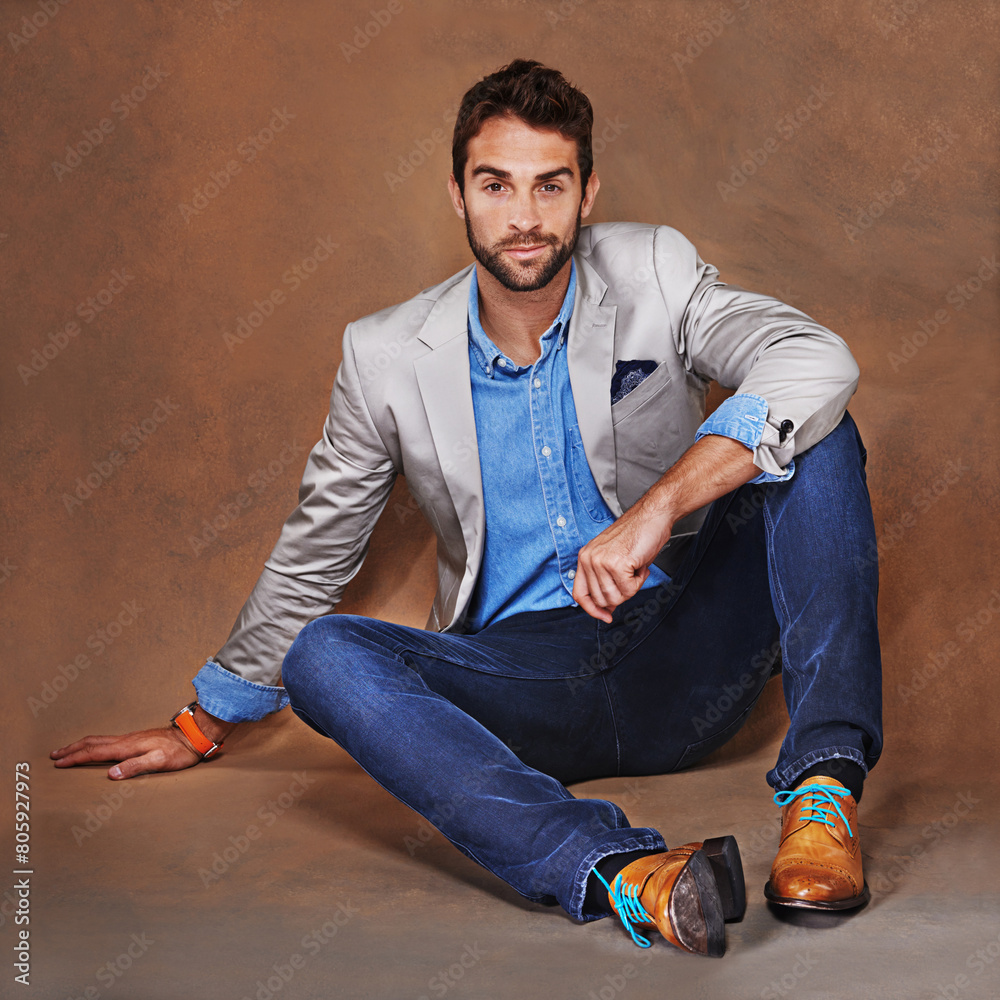 Poster style, smile and portrait of man in studio with trendy, stylish and classy suit with confidence. hap