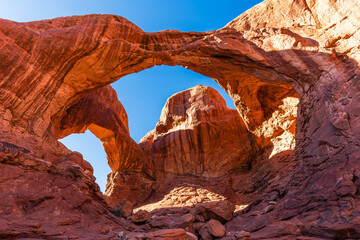 The Double Arch rock formation in the Arches National park near Moab, Utah USA.