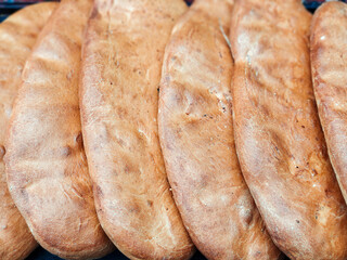 Fresh-baked caucasian bread for sale at the local city market