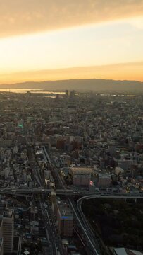 Vertical video - Sunset timelapse of Osaka city