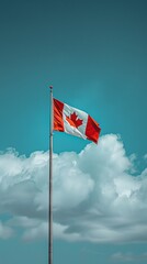 Canada flag on blue sky.