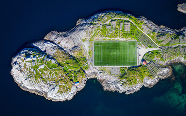 The Henningsvaer football Stadion on an island in Lofoten, Norway. Iconic soccerfield on an island...