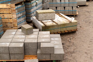a lot of paving stones for road construction