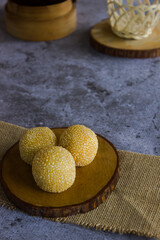 photo of a typical Indonesian food with the name sweet onde onde in a photo with a concept
