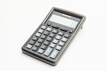 A classic pocket calculator with a black case and silver buttons, displaying a random number, resting on a white background.